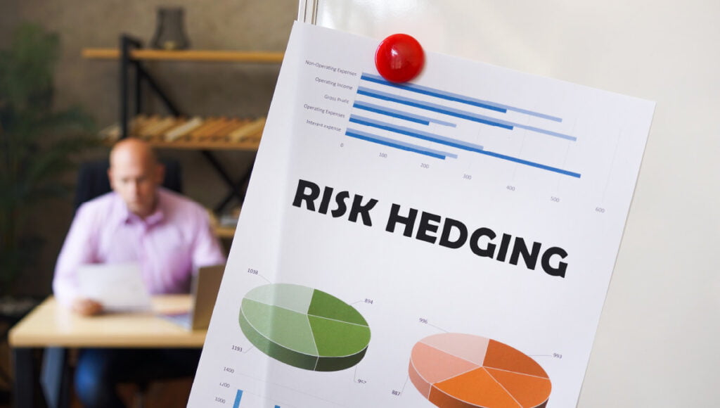 Risk hedging written on a page.