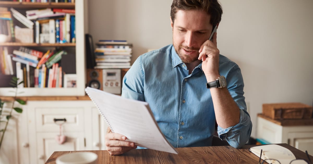 A self-employed man reviewing retirement account options