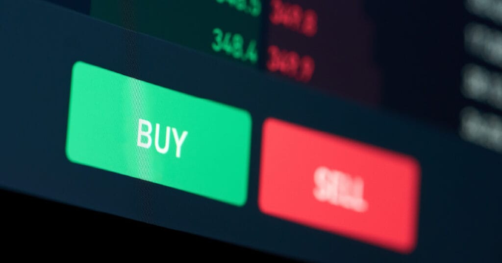 A stock trading platform with a green “buy” button representing automatic purchases through a Dividend Reinvestment Plan