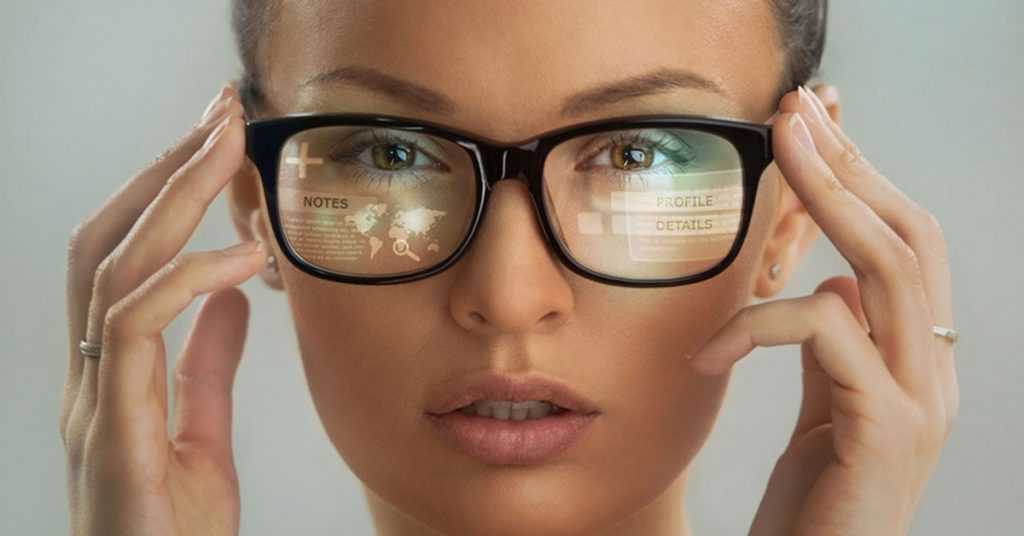 Close up shot of woman wearing smart glasses wearable technology